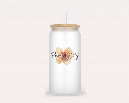 16oz frosted glass tumbler with a Peachtree City 30269 graphic featuring a large peach blossom | imperfect by design co