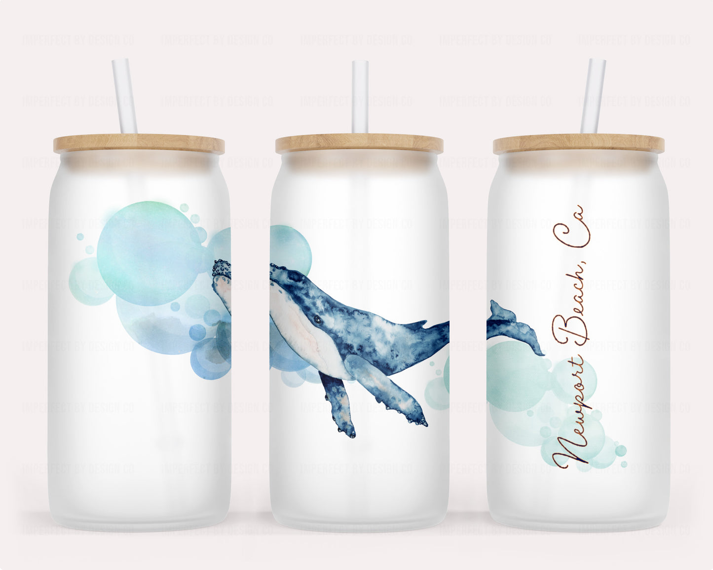 Beautifully crafted glass tumbler with a playful humpback whale design, ideal for ocean lovers | imperfect by design co