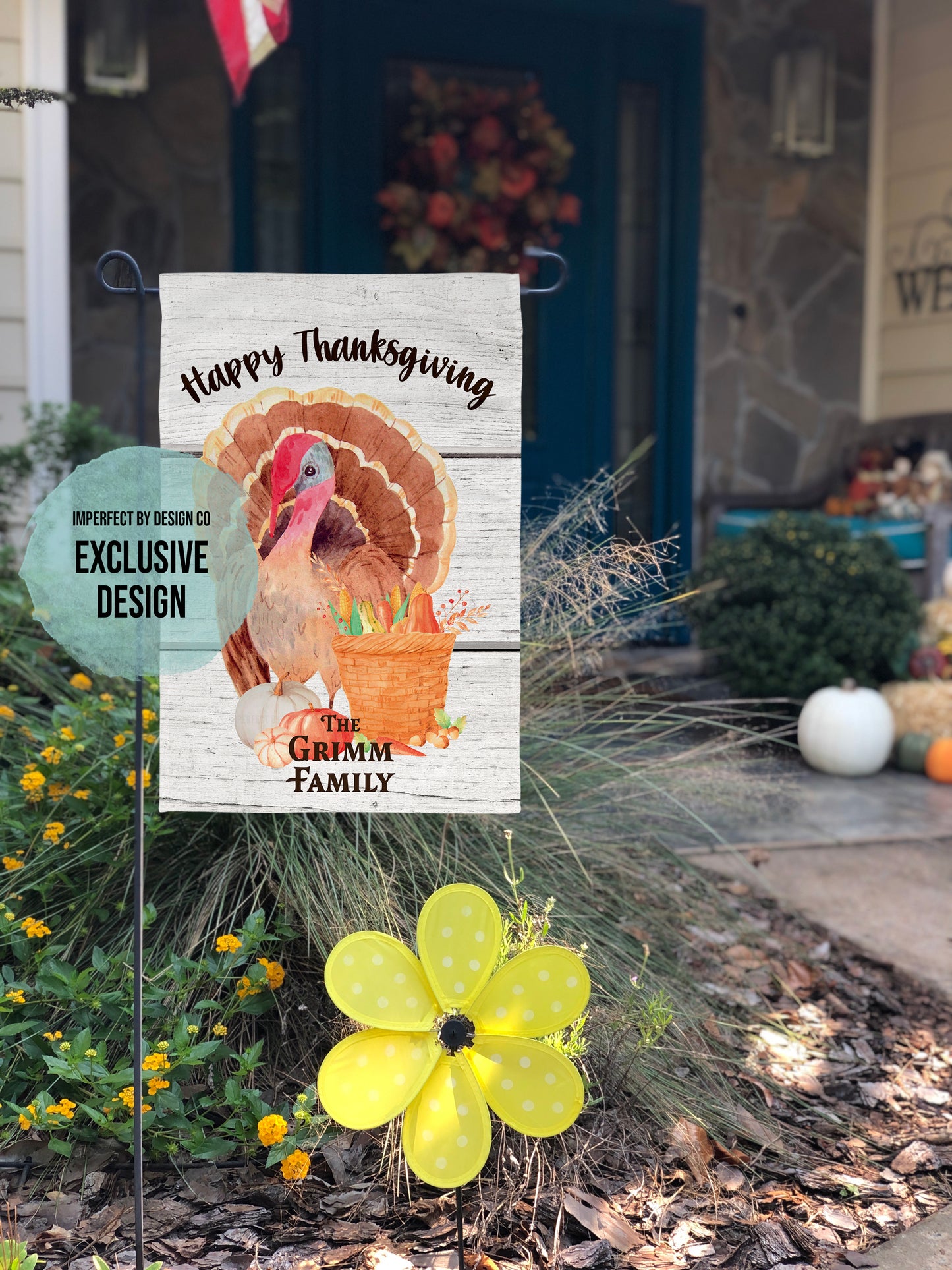 Thanksgiving garden flag with turkey, gourds, and personalized family name in vibrant colors.