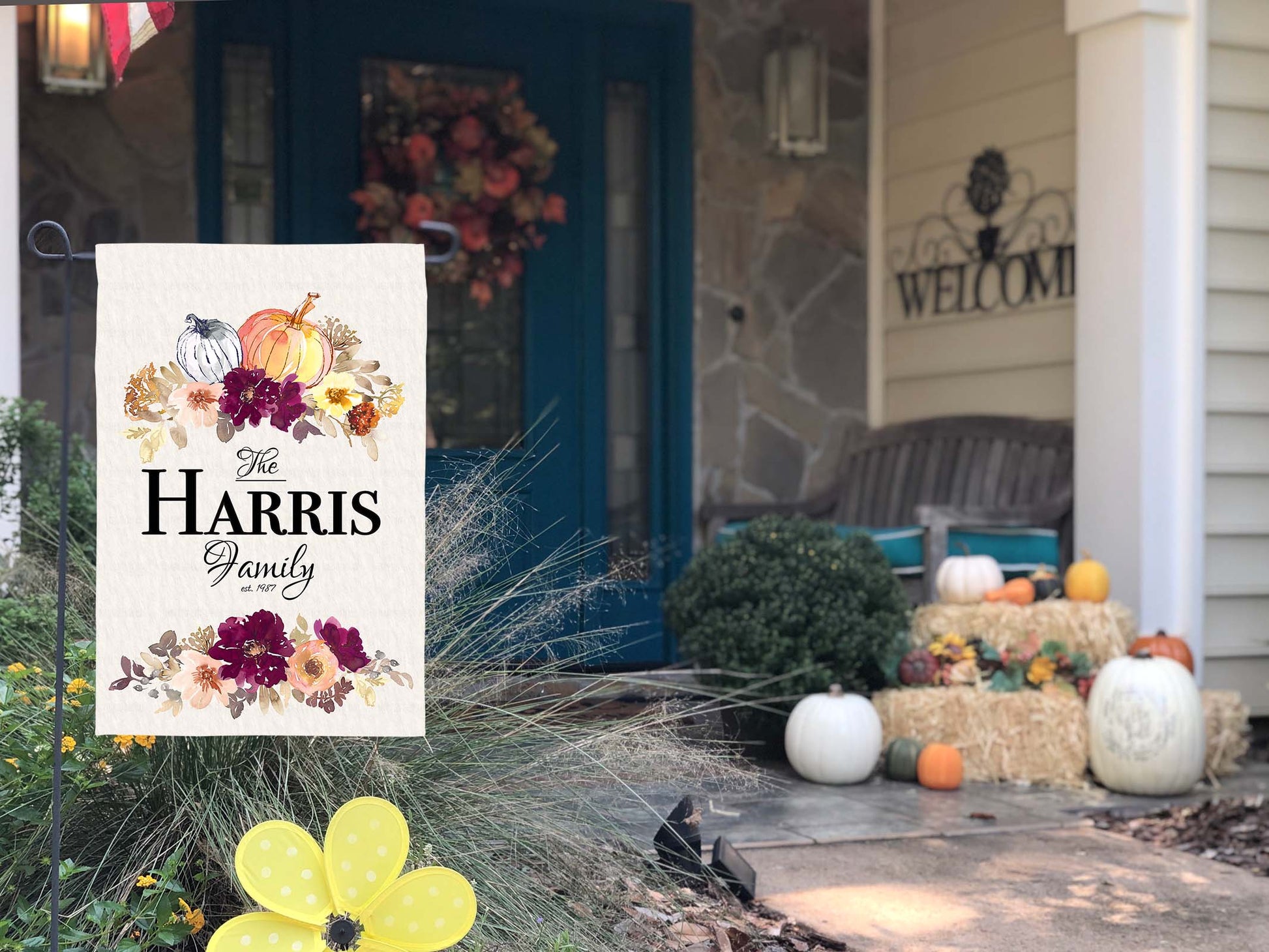 Custom fall garden flag featuring pumpkins and fall florals with family name and year established.