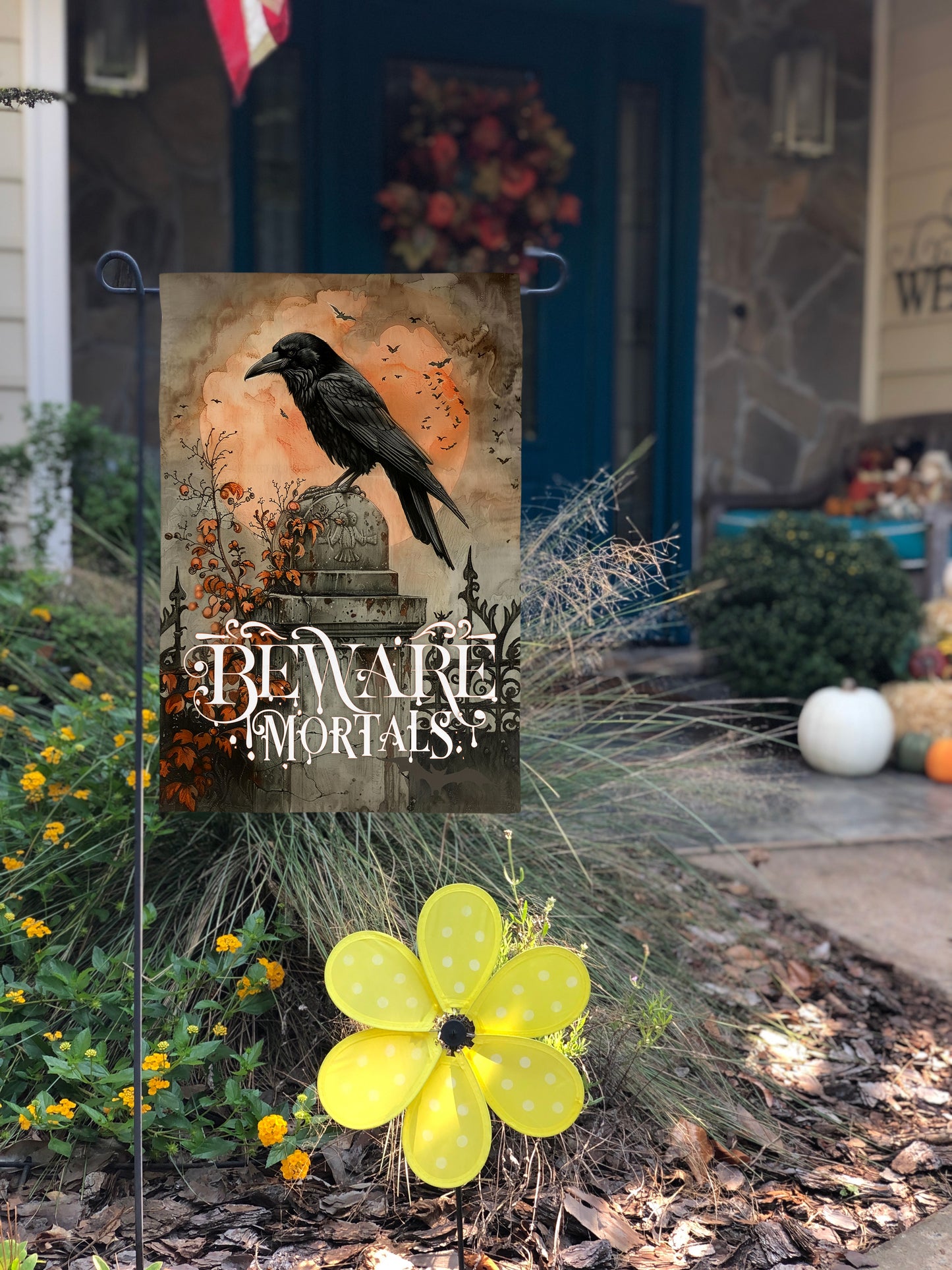 Halloween outdoor flag with bats, full moon, and raven on tombstone design for a spooky vibe.