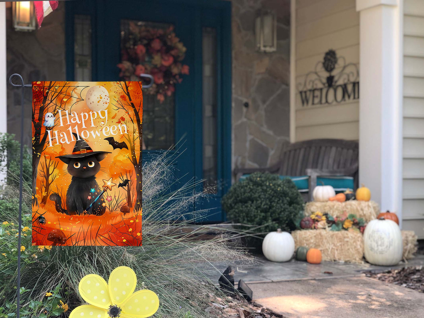 Cute Halloween flag with a black cat, witch's hat, spider webs, and bats in a forest trail scene.