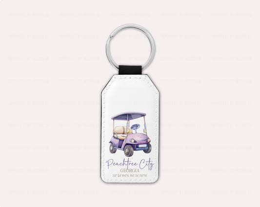 Peachtree City Keychain With Purple Golf Cart And Coordinates