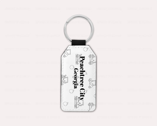 Peachtree City Keychain With Golf Carts & Peaches Pattern