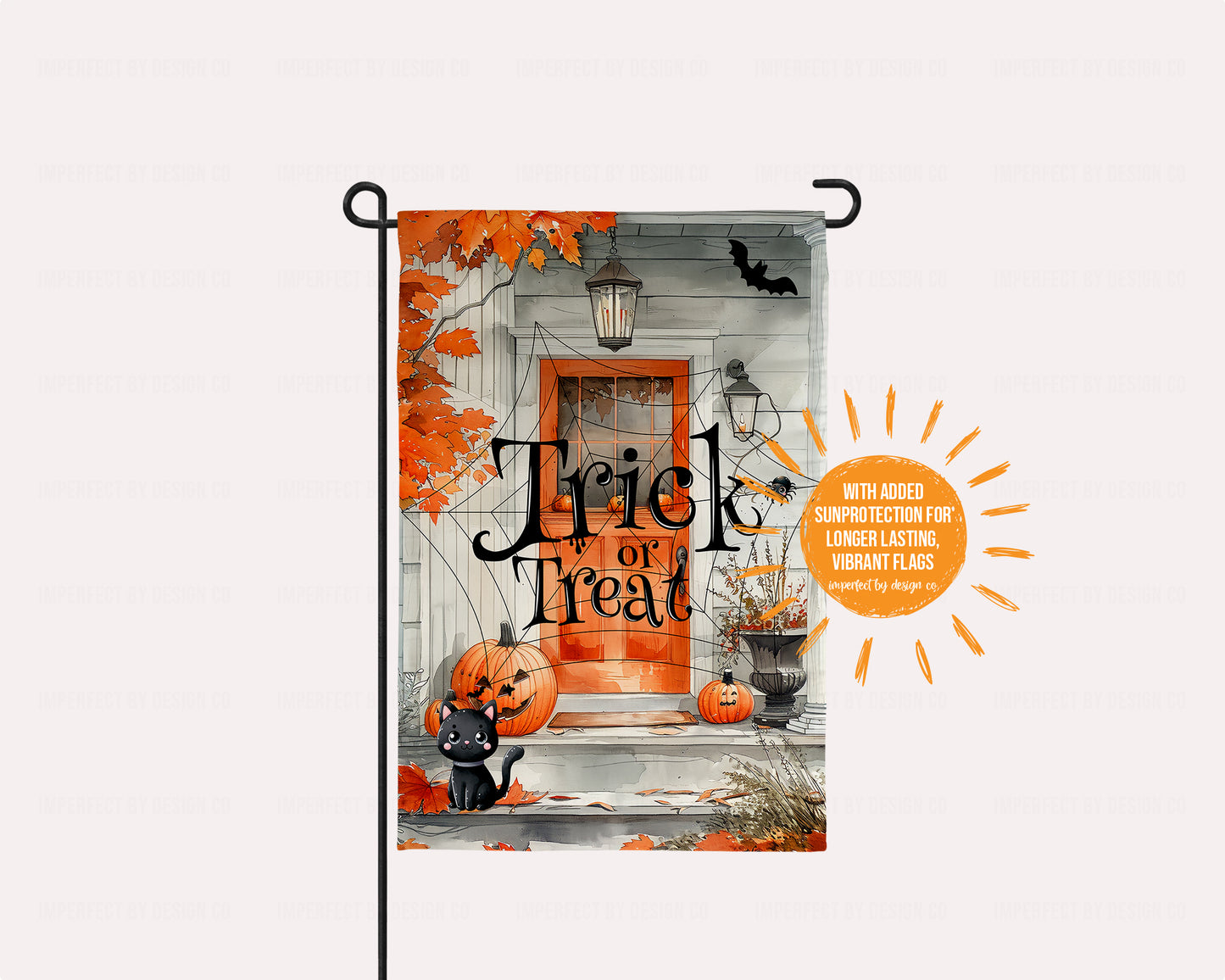 Whimsical Halloween garden flag with autumn leaves, jack-o-lanterns, and a cute black cat.
