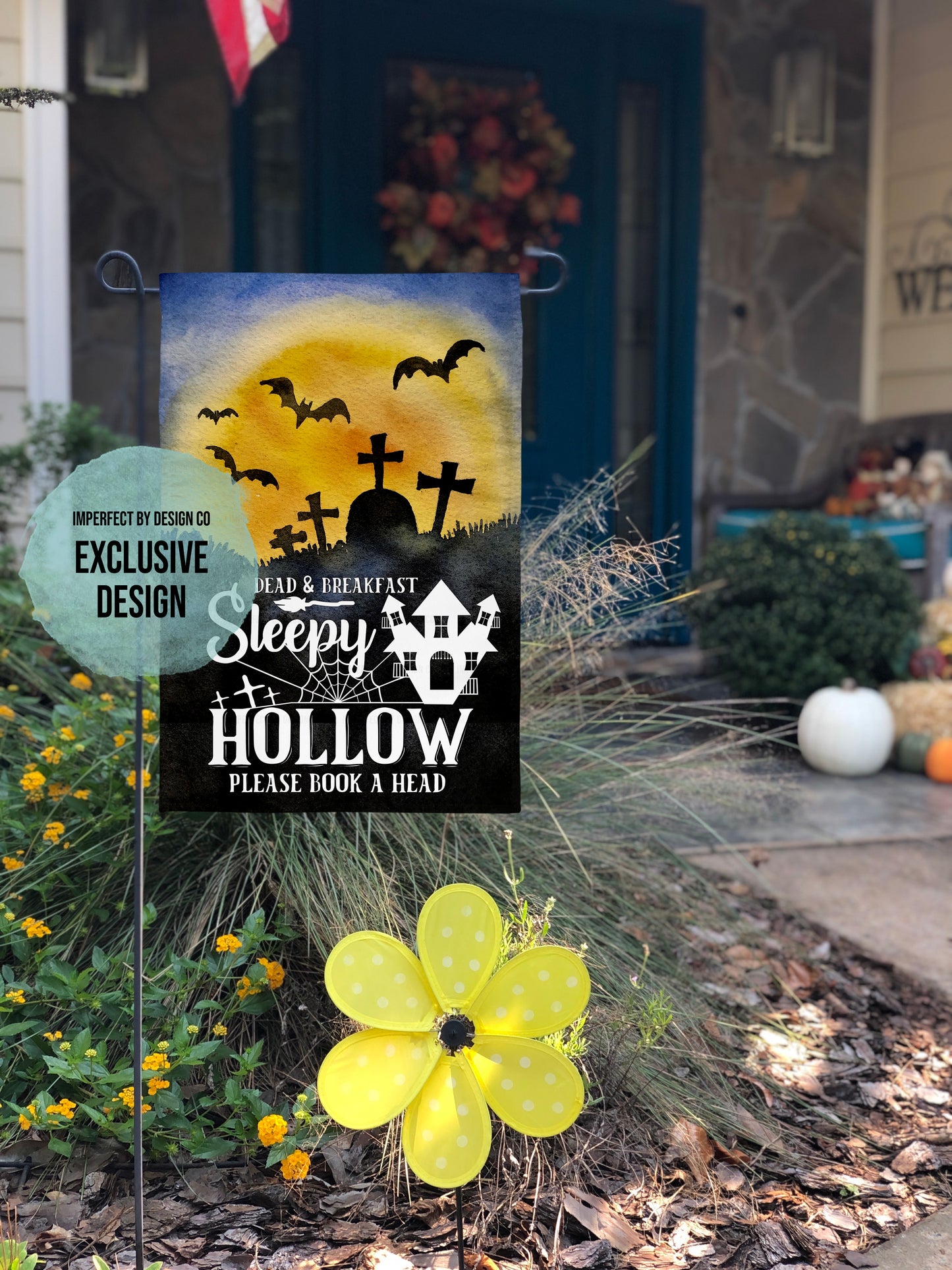 Spooky Sleepy Hollow-themed garden flag with eerie sunset, tombstones, bats, haunted house and Halloween message.