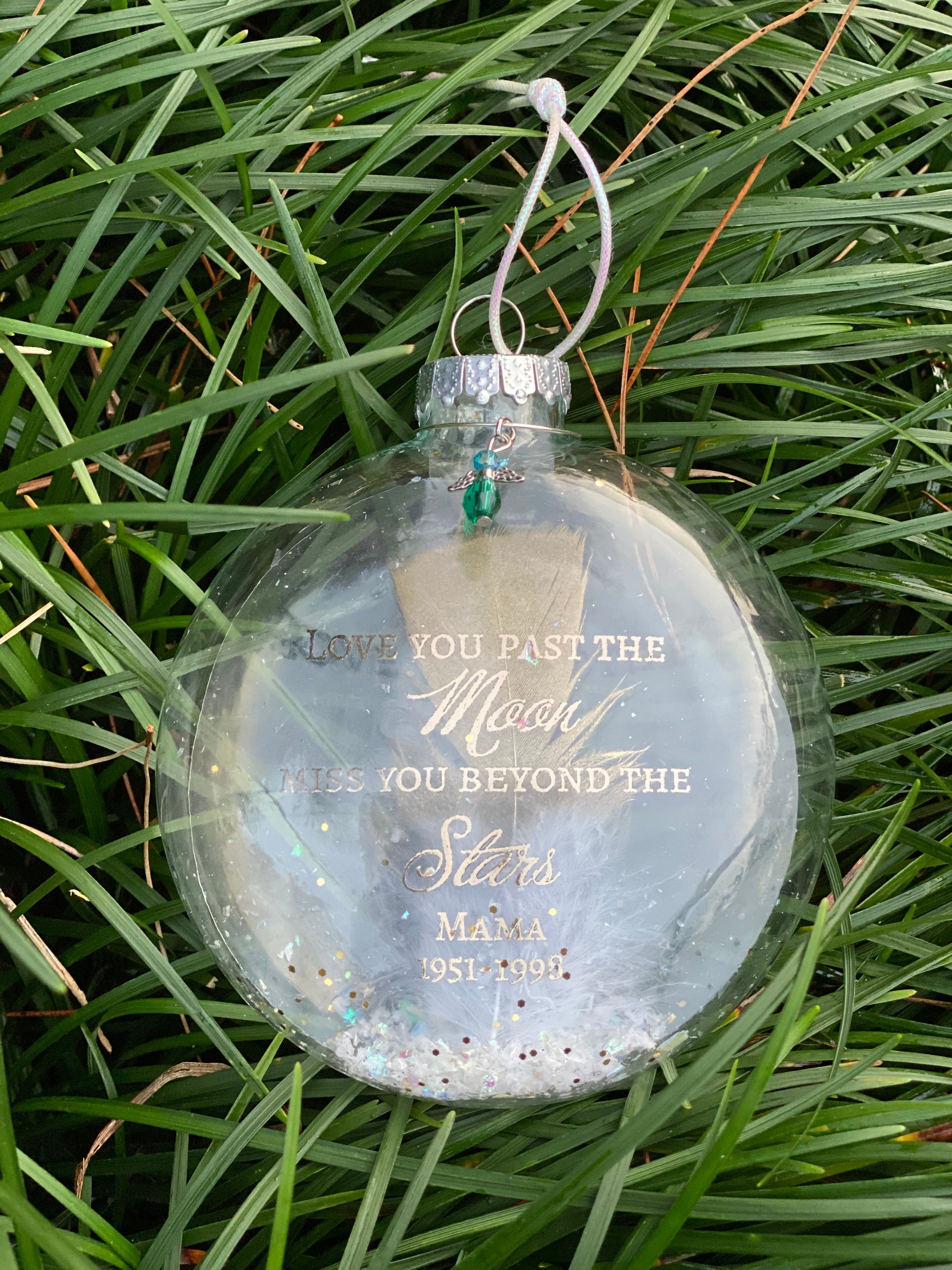 Elegant memorial ornament with gold glitter and sentimental tribute text