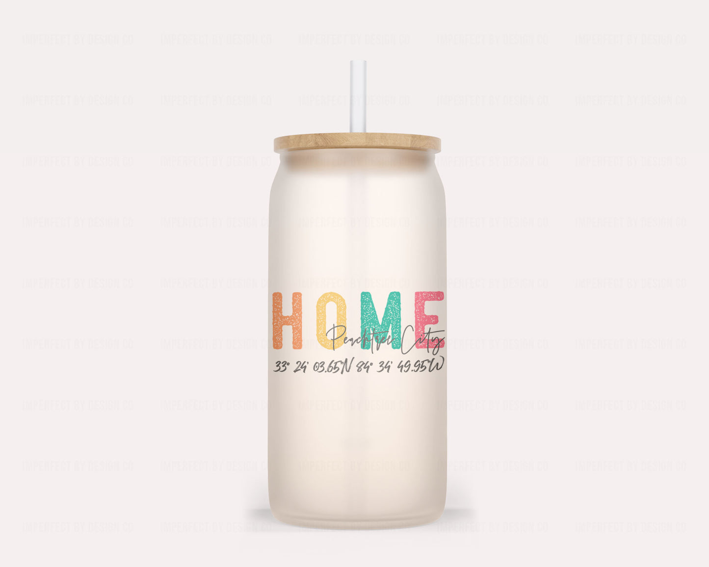 Whimsical glass tumbler that changes from frosted to bright Orange with cold liquid | imperfect by design co