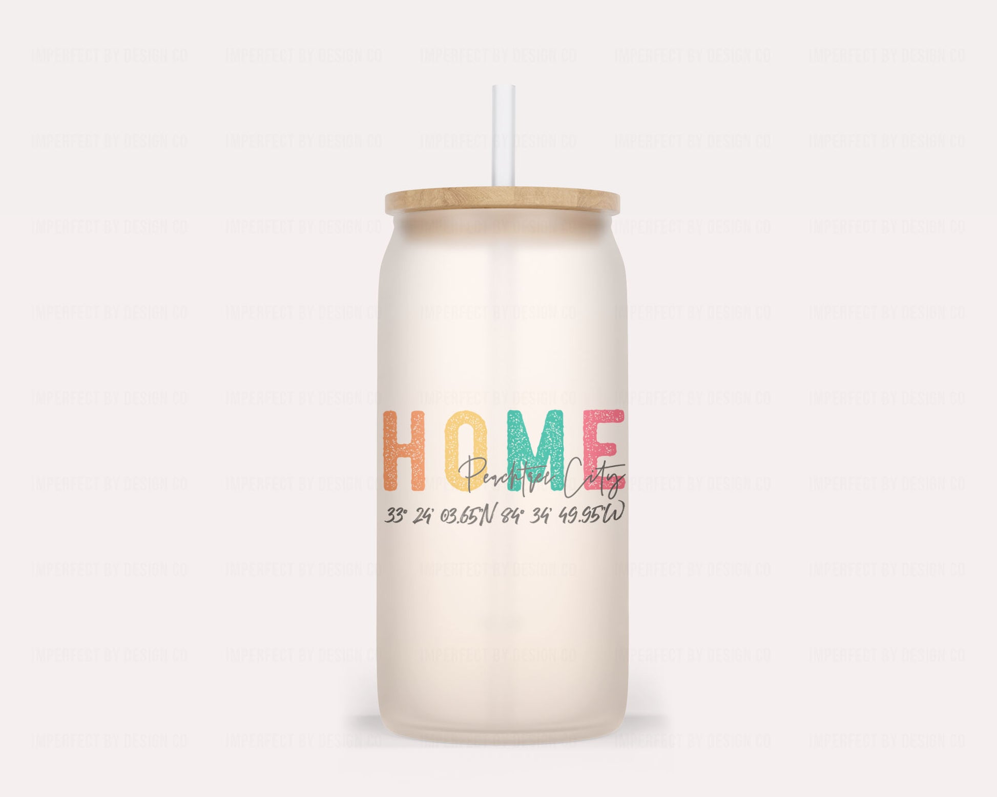 Whimsical glass tumbler that changes from frosted to bright Orange with cold liquid | imperfect by design co