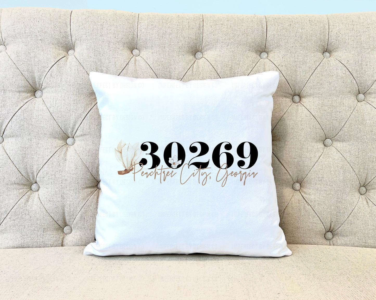 White velvet pillow cover with a large magnolia flower graphic, showcasing elegance and sophistication for your home decor. | imperfect by design co imperfect by design co