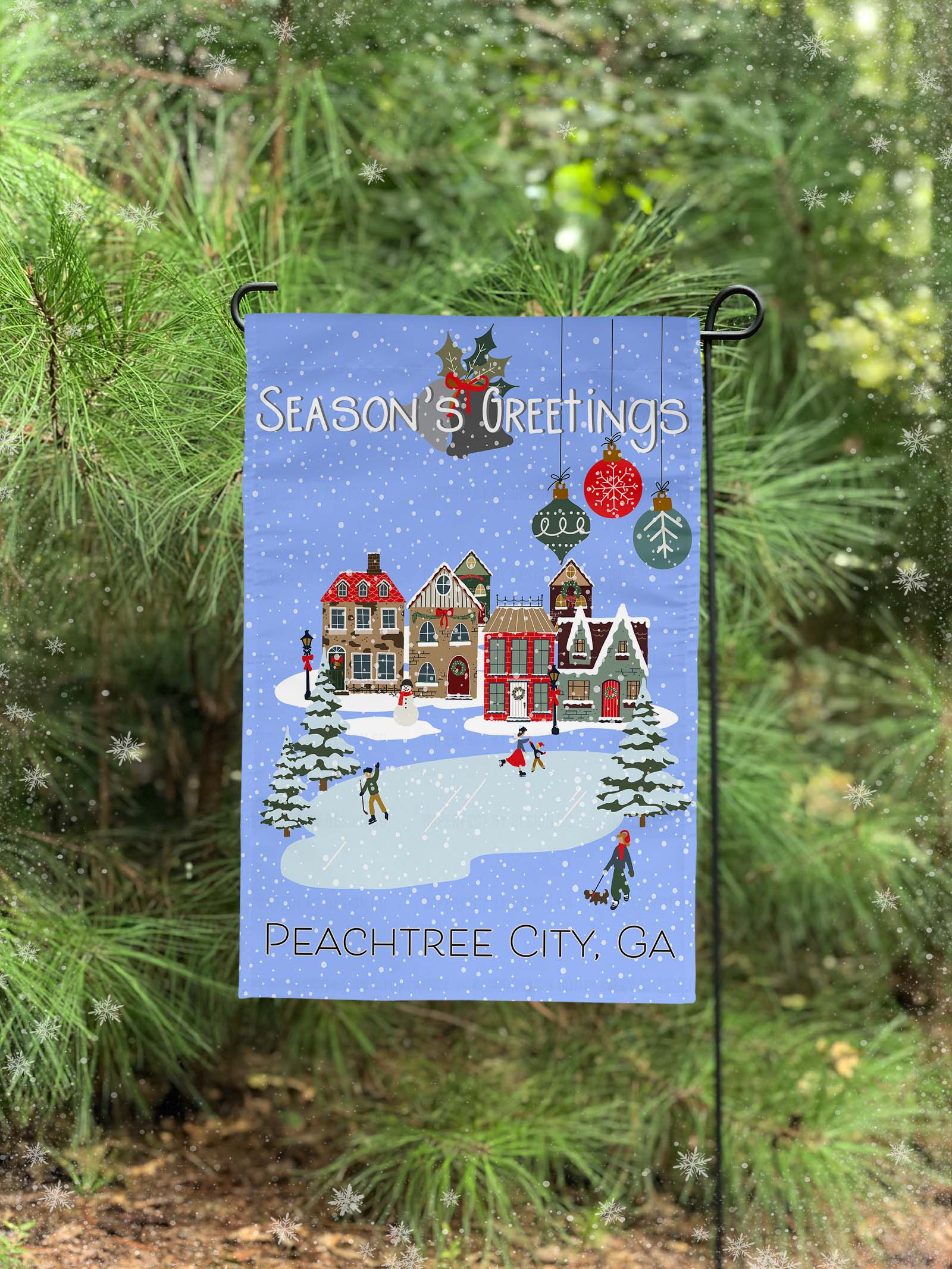 12x18 inch Personalized holiday garden flag featuring a quaint Christmas village and falling snow | imperfect by design co