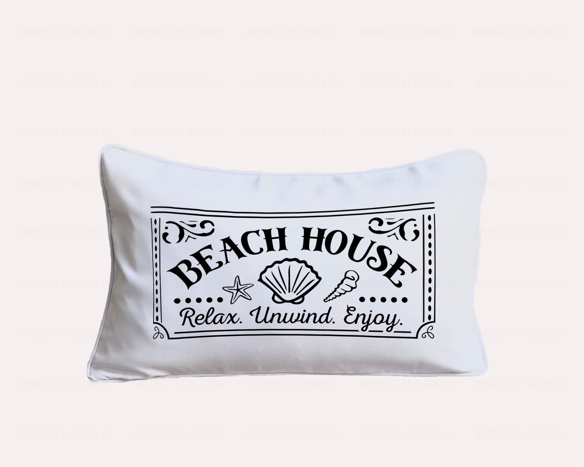 Front view of 12x20 pillow cover with seashell design and "BEACH HOUSE, Relax Unwind, Enjoy" text  | imperfect by design co