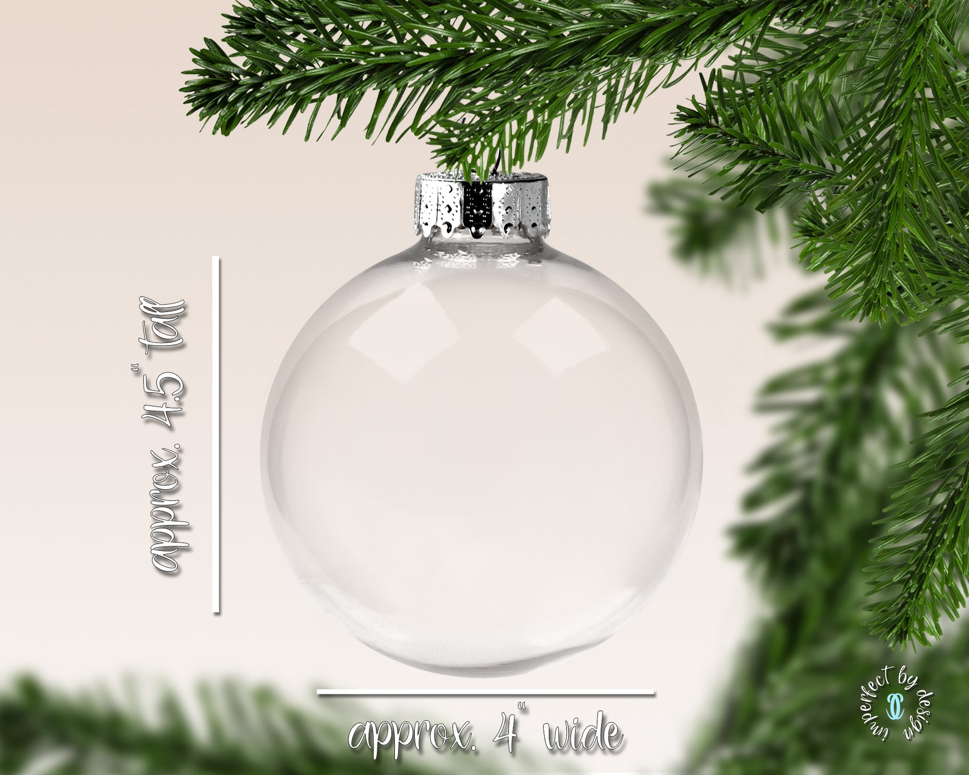 Clear glass disk shaped ornament measuring 4.5 x 4 inches approximately hanging from Christmas tree branch.