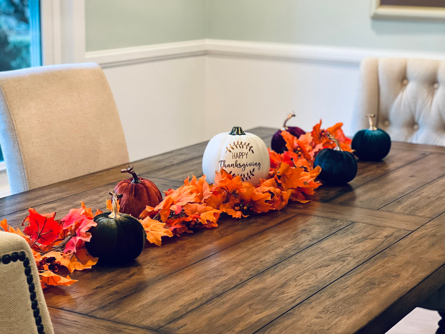 Happy Thanksgiving faux pumpkin on a table