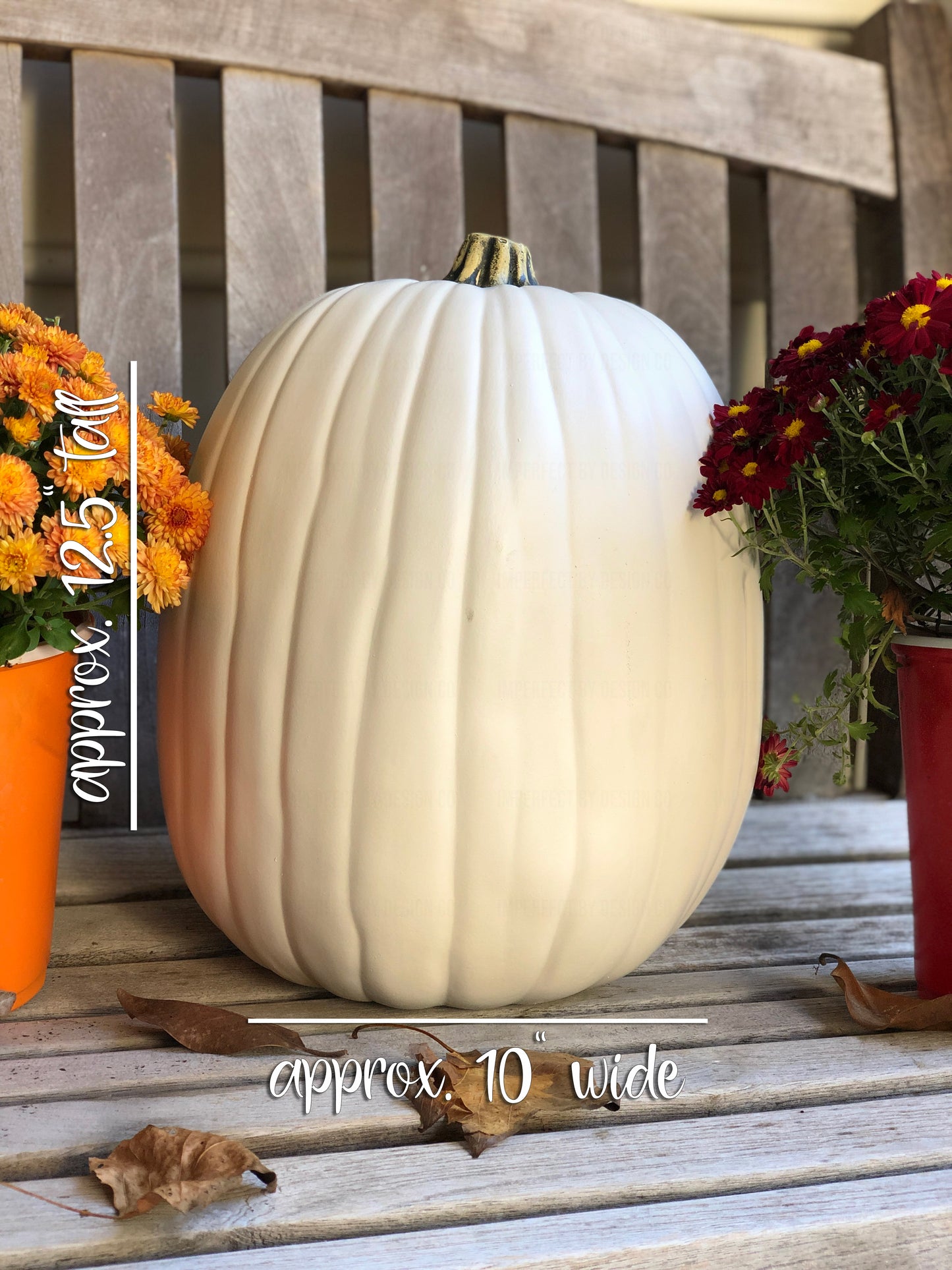 Large white faux pumpkin showing size of approximately 12.5 inches tall and 10 inches wide