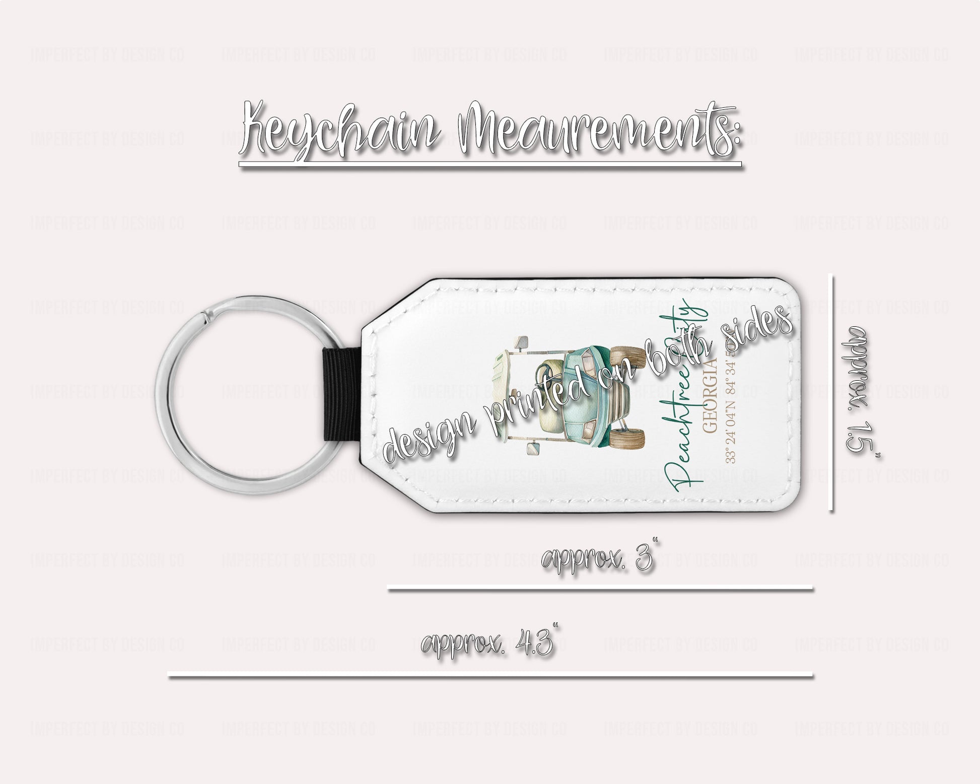 A white faux leather keychain with a blue golf cart and green text, including coordinates, and the text 'Peachtree City, GA'.  This image includes the measurement of the keychain. approximately 1.5 inches wide 3 inches without keyring and 4.3 inches including keyring. On a pale pink background | Exclusive design by imperfect by design co 