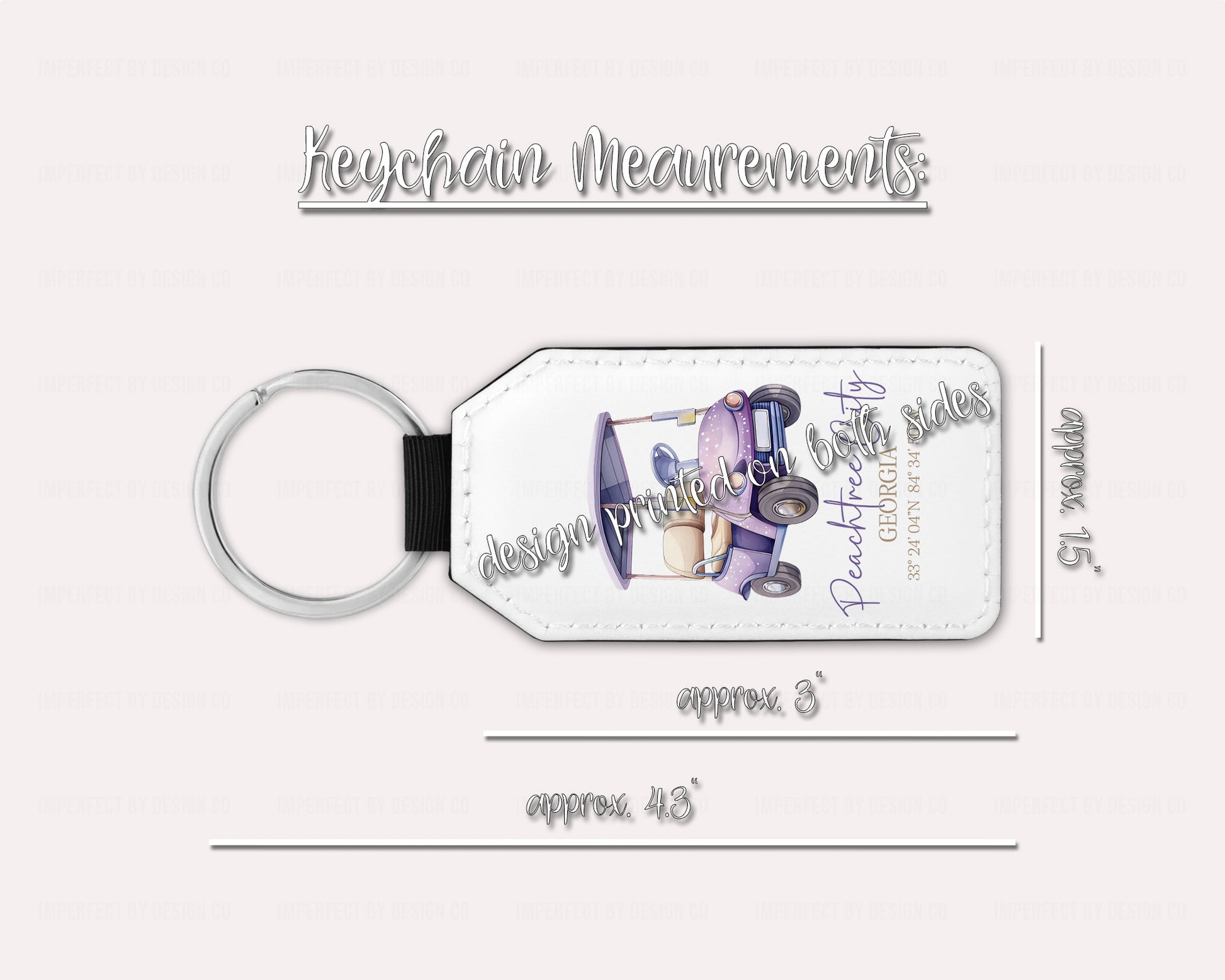 A white faux leather keychain with a purple golf cart and green text, including coordinates, and the text 'Peachtree City, GA'.  This image includes the measurement of the keychain. approximately 1.5 inches wide 3 inches without keyring and 4.3 inches including keyring. | imperfect by design co 