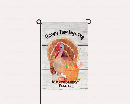 Personalized Thanksgiving garden flag with a male turkey and basket of gourds.
