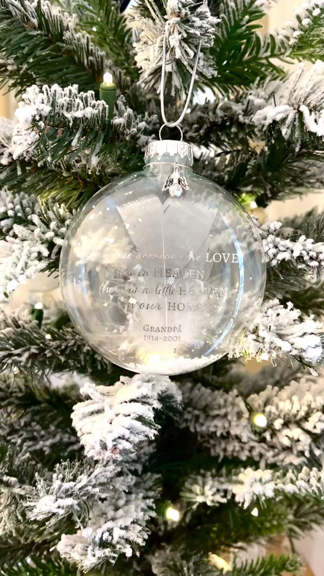 Video of Angel Charm with Faux Pearls on Memorial Ornament – A detailed view of the small stylized angel charm with faux pearls hanging from the ornament, symbolizing remembrance and love for those who have passed.