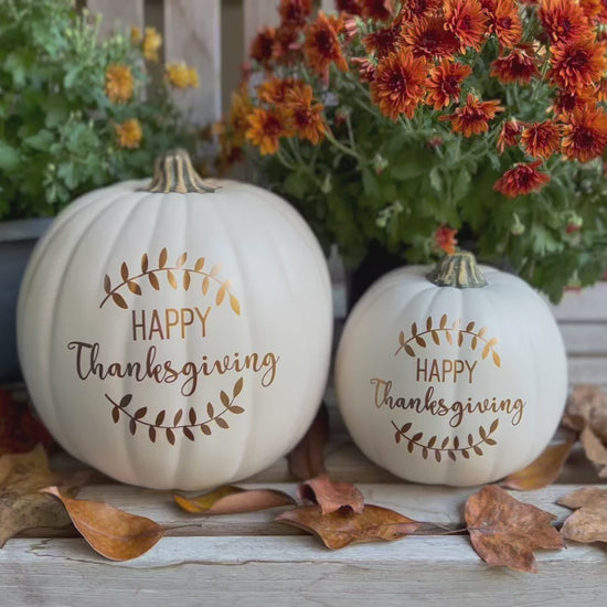 Video still of white decorative pumpkin set "Happy Thanksgiving"