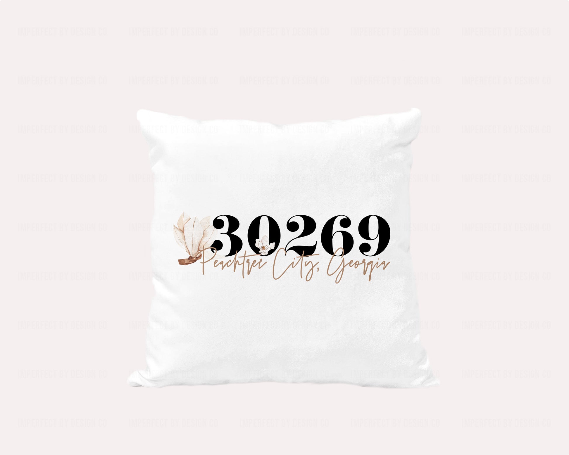 High-quality velvet pillow cover displaying a beautiful magnolia flower graphic and Peachtree City script font, perfect for adding a touch of nature to your living space. | imperfect by design co