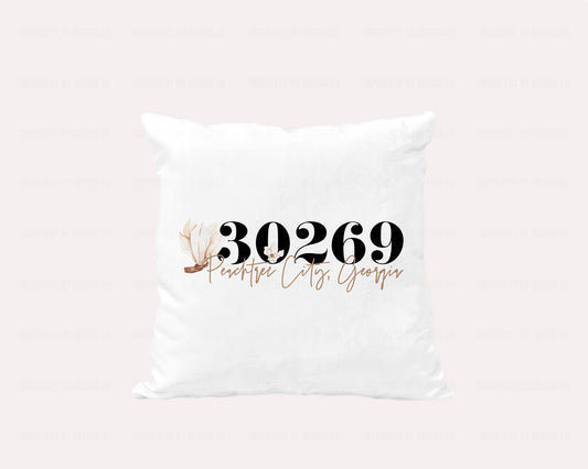 High-quality velvet pillow cover displaying a beautiful magnolia flower graphic and Peachtree City script font, perfect for adding a touch of nature to your living space. | imperfect by design co